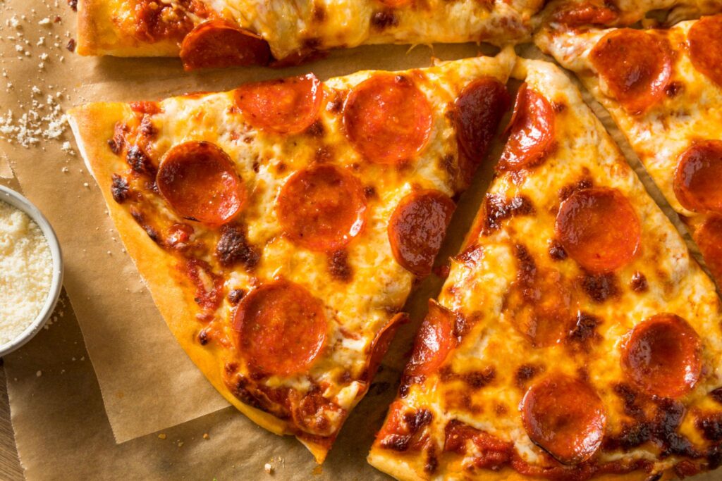 Pepperoni pizza reheated with crispy crust and melted cheese